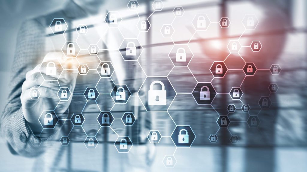 Businessperson interacting with digital padlocks representing cybersecurity measures