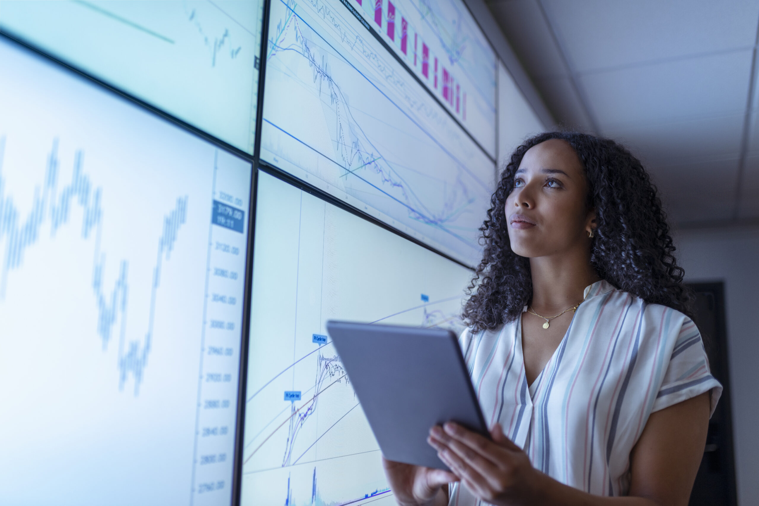 Top 5 benefits of SAP HANA in the cloud uk york businesswoman with tablet looking at cha 2024 10 18 08 37 09 utc scaled