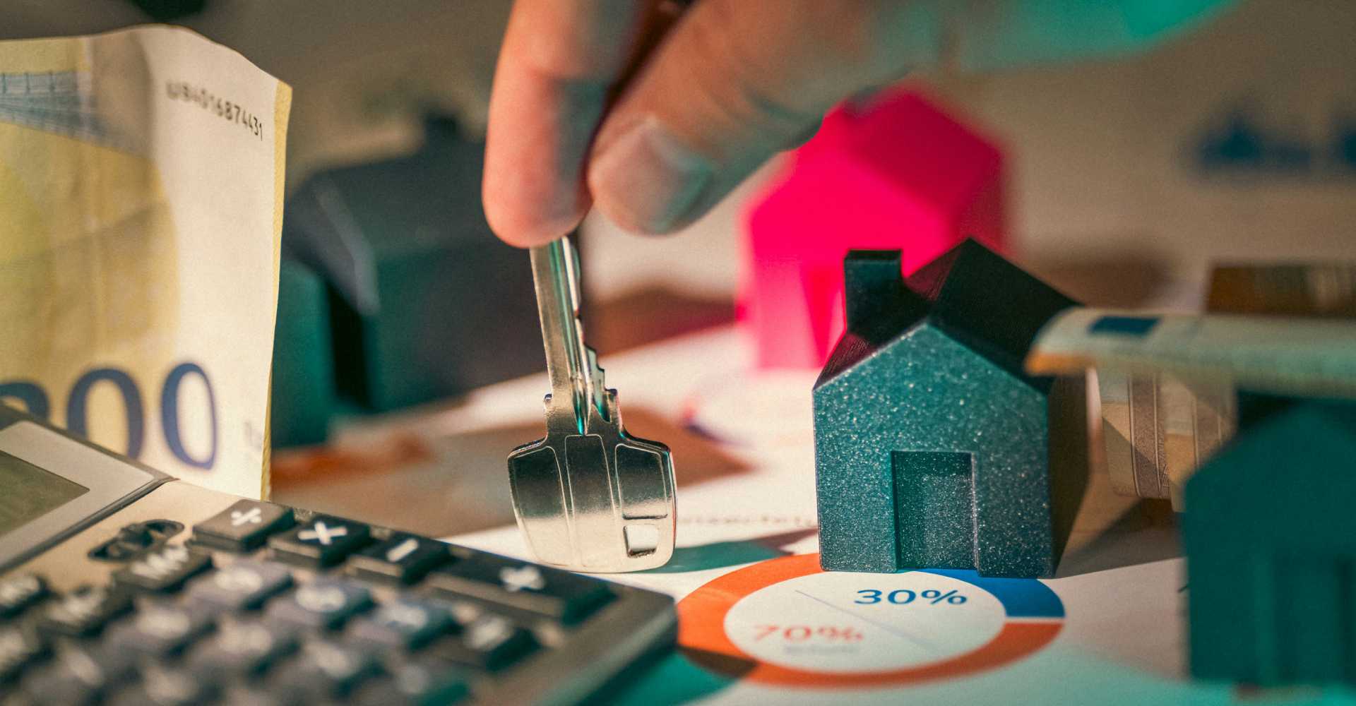 Photo of fingers holding a key down